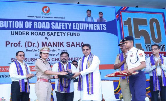 Tripura CM Dr Manik Saha hands over road safety equipment to SP Traffic in presence of minister Sushanta Chowdhury.